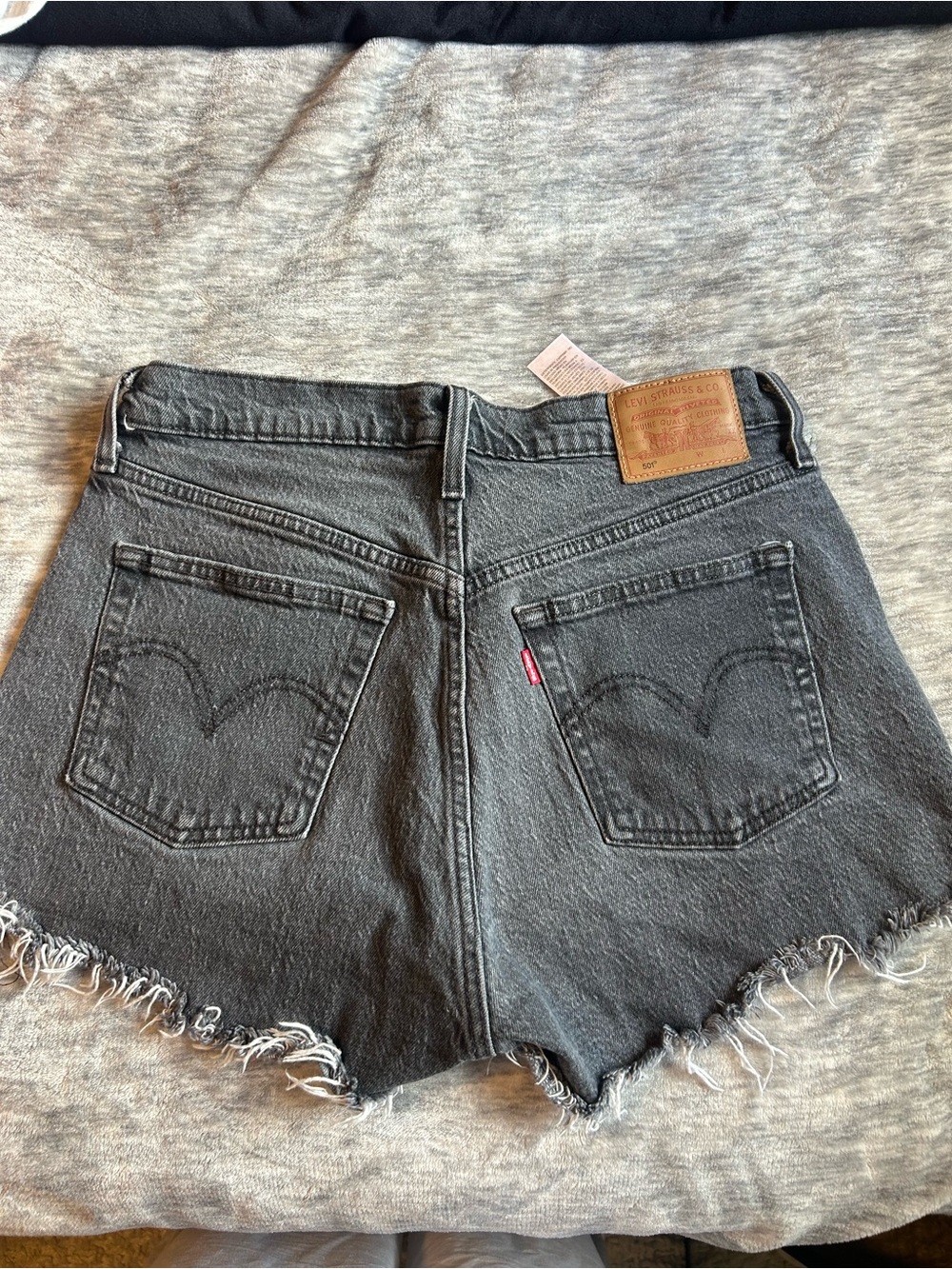 Levi's Washed Black Denim Cutoff Shorts